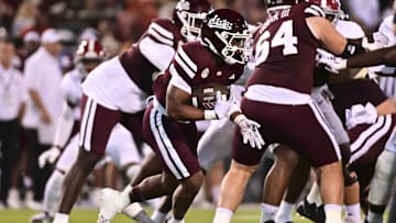 Sep 30, 2023; Starkville, Mississippi, USA;Mississippi State Bulldogs running back Seth Davis (23) runs the ball against the Alabama Crimson Tide during the second half at Davis Wade Stadium at Scott Field. Mandatory Credit: Matt Bush-Imagn Images