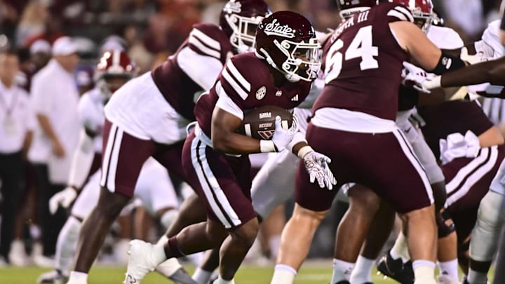 Sep 30, 2023; Starkville, Mississippi, USA;Mississippi State Bulldogs running back Seth Davis (23) runs the ball against the Alabama Crimson Tide during the second half at Davis Wade Stadium at Scott Field. Mandatory Credit: Matt Bush-Imagn Images