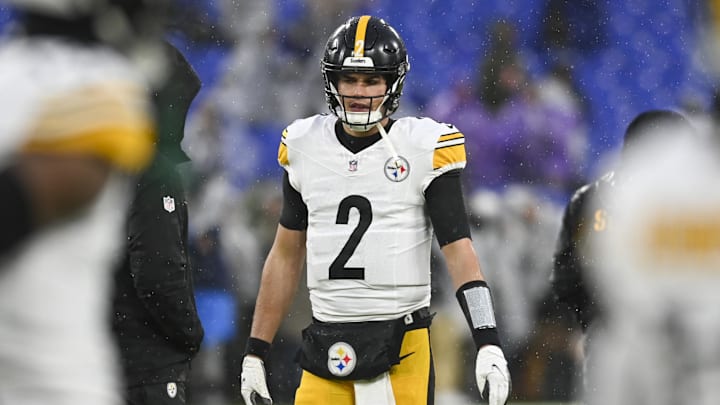 Jan 6, 2024; Baltimore, Maryland, USA;  Pittsburgh Steelers quarterback Mason Rudolph (2) walks on the field as rain come down prior to the start of the game against the Baltimore Ravens at M&T Bank Stadium. Mandatory Credit: Tommy Gilligan-Imagn Images