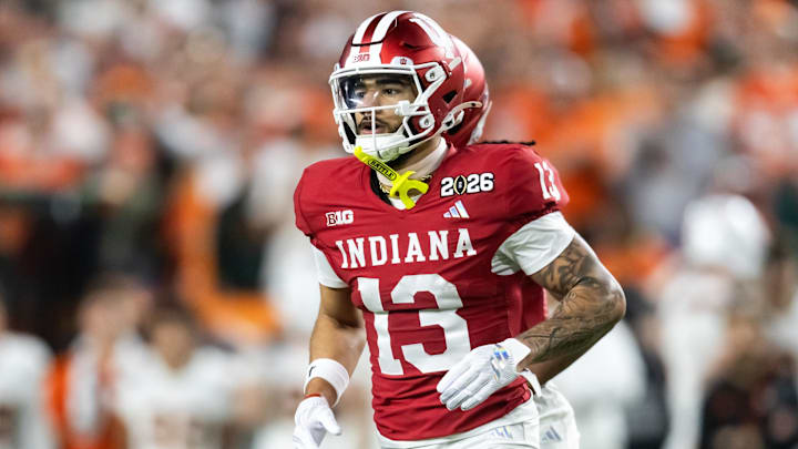 Jan 19, 2026; Miami Gardens, FL, USA; Indiana Hoosiers wide receiver Elijah Sarratt (13) against the Miami Hurricanes in the College Football Playoff National Championship game at Hard Rock Stadium. Mandatory Credit: Mark J. Rebilas-Imagn Images