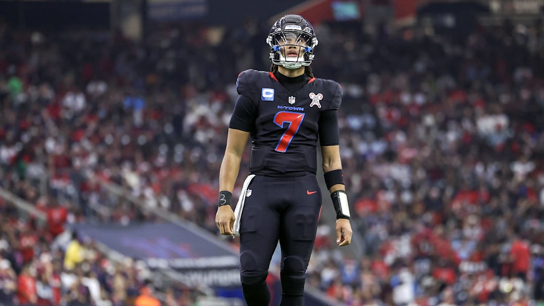 Dec 25, 2024; Houston, Texas, USA;  Houston Texans quarterback C.J. Stroud (7) reacts after a play during the game against the Baltimore Ravens at NRG Stadium. Mandatory Credit: Troy Taormina-Imagn Images