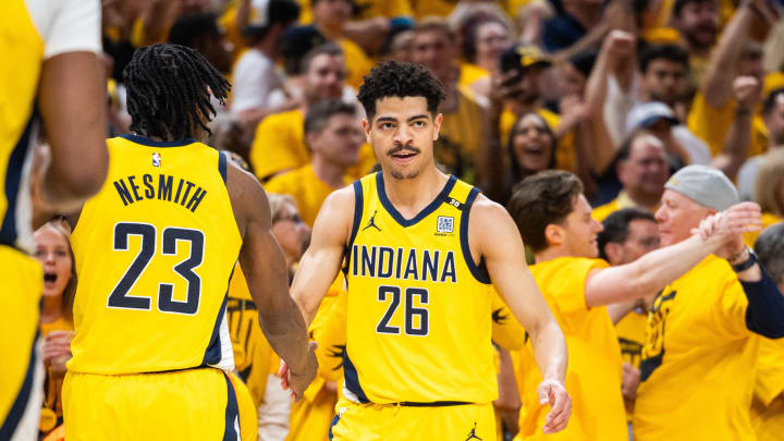 May 2, 2024; Indianapolis, Indiana, USA; Indiana Pacers guard Ben Sheppard (26) celebrates a basket with forward Aaron Nesmith (23) during game six of the first round for the 2024 NBA playoffs against the Milwaukee Bucks at Gainbridge Fieldhouse. Mandatory Credit: Trevor Ruszkowski-USA TODAY Sports