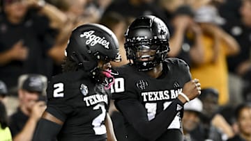 Oct 26, 2024; College Station, Texas, USA; Texas A&M Aggies quarterback Marcel Reed (10) celebrates after scoring a touchdown in the fourth quarter against the LSU Tigers at Kyle Field. Mandatory Credit: Maria Lysaker-Imagn Images. 