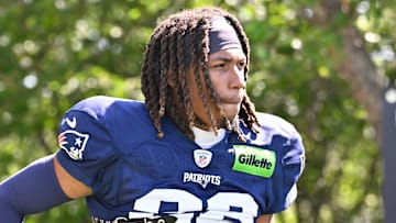 Jul 28, 2025; Foxborough, MA, USA; New England Patriots cornerback Alex Austin (28) heads to the practice fields for training camp at Gillette Stadium. Mandatory Credit: Eric Canha-Imagn Images