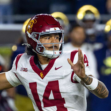 Oct 18, 2025; South Bend, Indiana, USA; Southern California Trojans quarterback Jayden Maiava (14) passes the ball against the Notre Dame Fighting Irish during the first half at Notre Dame Stadium. Mandatory Credit: Michael Caterina-Imagn Images