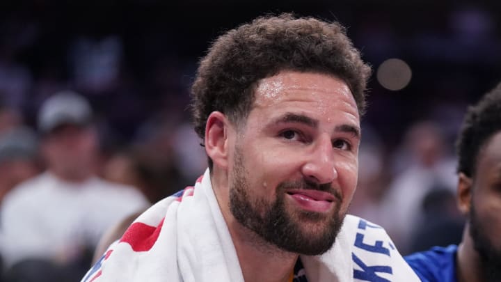 Apr 16, 2024; Sacramento, California, USA; Golden State Warriors guard Klay Thompson (11) sits on the bench during action against the Sacramento Kings in the fourth quarter during a play-in game of the 2024 NBA playoffs at the Golden 1 Center. Mandatory Credit: Cary Edmondson-USA TODAY Sports