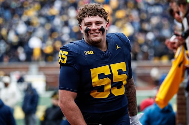 Michigan defensive lineman Mason Graham walks up the tunnel for halftime during the spring game at Michigan Stadium in Ann Ar