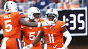 Aug 31, 2024; Charlottesville, Virginia, USA; Virginia Cavaliers wide receiver Trell Harris (11) celebrates with Cavaliers running back Kobe Pace (5) after scoring a touchdown against the Richmond Spiders during the first half at Scott Stadium. Mandatory Credit: Amber Searls-Imagn Images