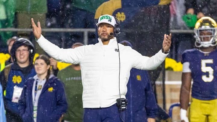 Oct 18, 2025; South Bend, Indiana, USA;  Notre Dame Fighting Irish head coach Marcus Freeman reacts to the play against the Southern California Trojans during the second half at Notre Dame Stadium. Mandatory Credit: Michael Caterina-Imagn Images