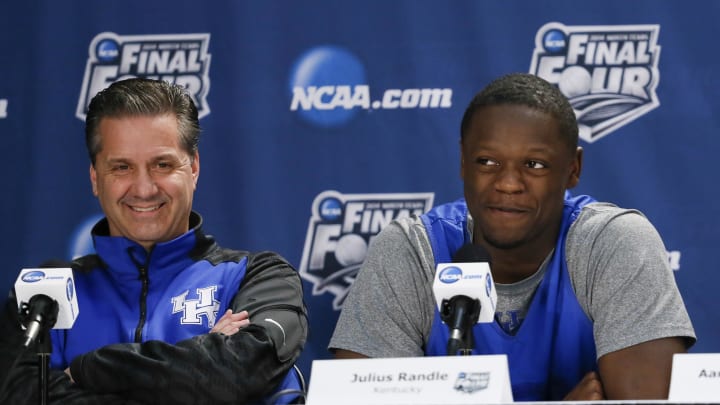 Apr 6, 2014; Arlington, TX, USA; Kentucky Wildcats head coach John Calipari (left) and forward