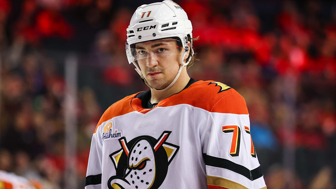 Apr 3, 2025; Calgary, Alberta, CAN; Anaheim Ducks right wing Frank Vatrano (77) against the Calgary Flames during the third period at Scotiabank Saddledome. Mandatory Credit: Sergei Belski-Imagn Images