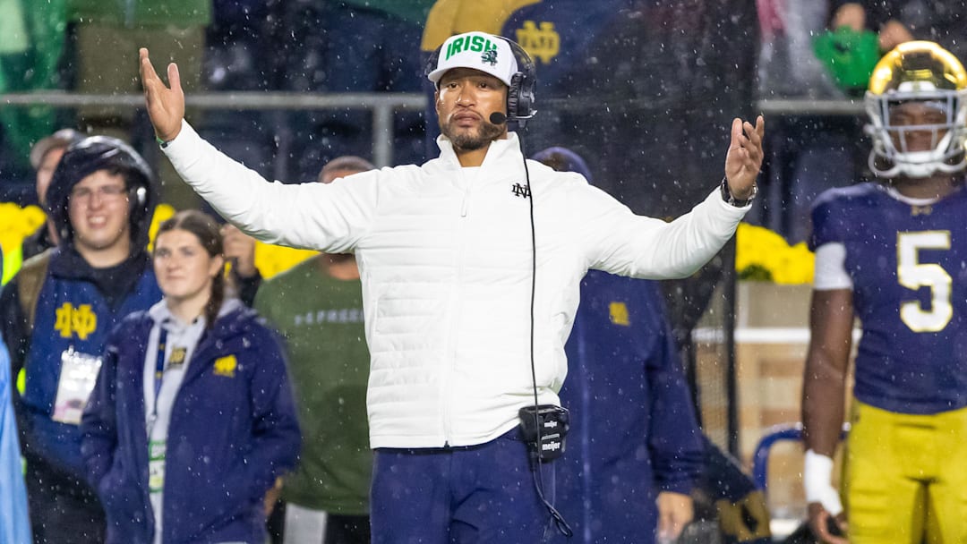 Oct 18, 2025; South Bend, Indiana, USA;  Notre Dame Fighting Irish head coach Marcus Freeman reacts to the play against the Southern California Trojans during the second half at Notre Dame Stadium. Mandatory Credit: Michael Caterina-Imagn Images