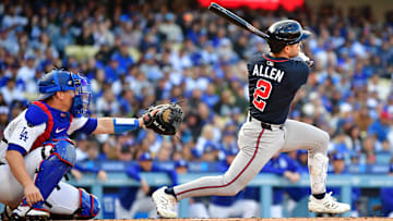 Apr 2, 2025; Los Angeles, California, USA; Atlanta Braves shortstop Nick Allen (2) hits a RBI single during the first inning against the Los Angeles Dodgers at Dodger Stadium. Mandatory Credit: Gary A. Vasquez-Imagn Images