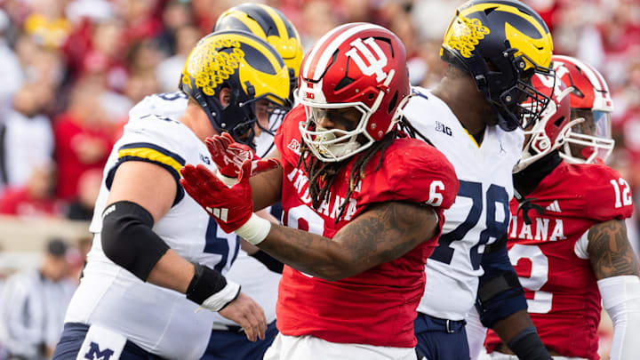Indiana Hoosiers defensive lineman Mikail Kamara (6) celebrates his tackle in the first quarter against the Michigan Wolverines at Memorial Stadium. Indiana Hoosiers defensive lineman Mikail Kamara (6) celebrates his tackle in the first quarter against the Michigan Wolverines at Memorial Stadium.