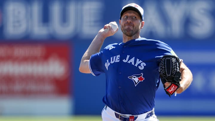 Mar 2, 2025: Toronto Blue Jays pitcher Max Scherzer (31) throws a pitch against the Philadelphia Phillies in the second inning during spring training at TD Ballpark. 