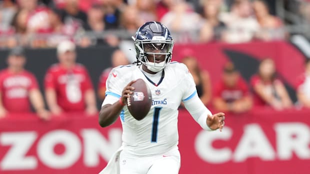 Tennessee Titans quarterback Cam Ward runs with the ball against the Arizona Cardinals