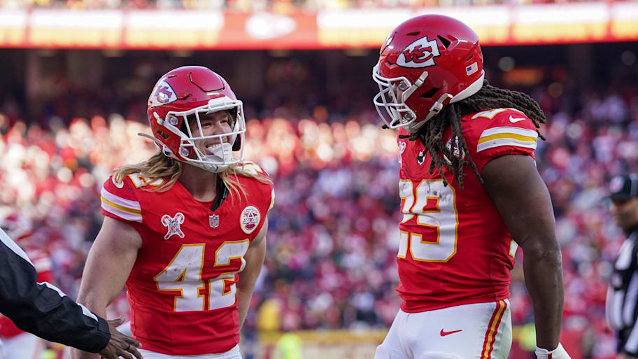Dec 21, 2024; Kansas City, Missouri, USA; Kansas City Chiefs running back Kareem Hunt (29) celebrates with running back Carson Steele (42) after a play against the Houston Texans during the second half at GEHA Field at Arrowhead Stadium. Mandatory Credit: Denny Medley-Imagn Images | Denny Medley-Imagn Images