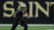 Oct 12, 2025; New Orleans, Louisiana, USA; New Orleans Saints quarterback Spencer Rattler (2) runs for a gain during the first quarter against the New England Patriots at Caesars Superdome. Mandatory Credit: Stephen Lew-Imagn Images