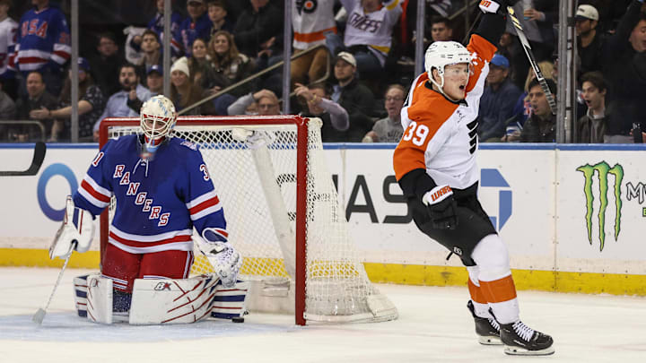 Feb 26, 2026; New York, New York, USA;  Philadelphia Flyers right wing Matvei Michkov (39) celebrates after scoring a the game winning goal in overtime against the New York Rangers at Madison Square Garden. 