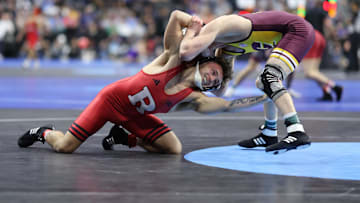 Dylan Shawver of Rutgers (L) wrestles Sean Spidle of Central Michigan
