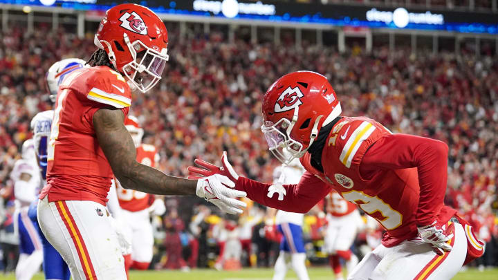 Dec 10, 2023; Kansas City, Missouri, USA; Kansas City Chiefs wide receiver Rashee Rice (4) celebrates with wide receiver Kadarius Toney (19) after scoring against the Buffalo Bills during the first half at GEHA Field at Arrowhead Stadium.