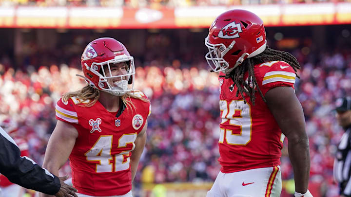 Kansas City Chiefs running back Kareem Hunt celebrates with Carson Steele after a play against the Houston Texans Kansas City Chiefs running back Kareem Hunt celebrates with Carson Steele after a play against the Houston Texans