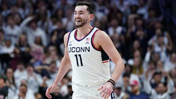 Nov 10, 2025; Storrs, Connecticut, USA; UConn Huskies forward Alex Karaban (11) reacts after his basket against the Columbia Lions in the first half at Harry A. Gampel Pavilion. Mandatory Credit: David Butler II-Imagn Images