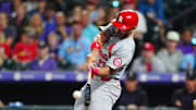 Sep 24, 2024; Denver, Colorado, USA; St. Louis Cardinals designated hitter Matt Carpenter (13) doubles in the seventh inning against the Colorado Rockies at Coors Field. 