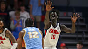 Nov 4, 2024; Oxford, Mississippi, USA; Mississippi Rebels forward John Bol (10) defends Long Island Sharks guard Brent Davis (12) during the second half at The Sandy and John Black Pavilion at Ole Miss. Mandatory Credit: Petre Thomas-Imagn Images