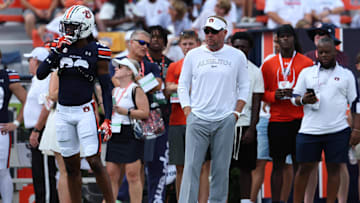 Sep 7, 2024; Auburn, Alabama, USA;  Auburn Tigers head coach Hugh Freeze watches his team warm up before the game against the California Golden Bears at Jordan-Hare Stadium. Mandatory Credit: John Reed-Imagn Images