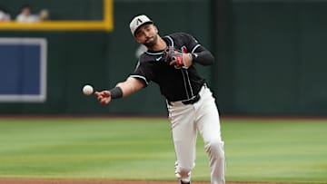 May 17, 2025; Phoenix, Arizona, USA; Arizona Diamondbacks second baseman Jordan Lawlar (10) throws to first against the Colorado Rockies in the second inning at Chase Field. Mandatory Credit: Jacob Reiner-Imagn Images