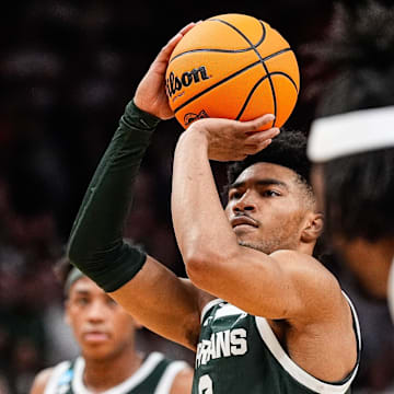 Michigan State guard Jaden Akins (3) attempts a free throw against Auburn during the first half of the Elite Eight round of NCAA tournament at State Farm Arena in Atlanta, Ga. on Sunday, March 30, 2025.
