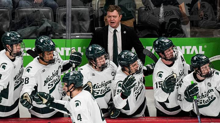 Michigan State head coach Adam Nightingale talks to players after a play against Michigan during the second period of Duel in the D at Little Caesars Arena in Detroit on Saturday, February 7, 2026.