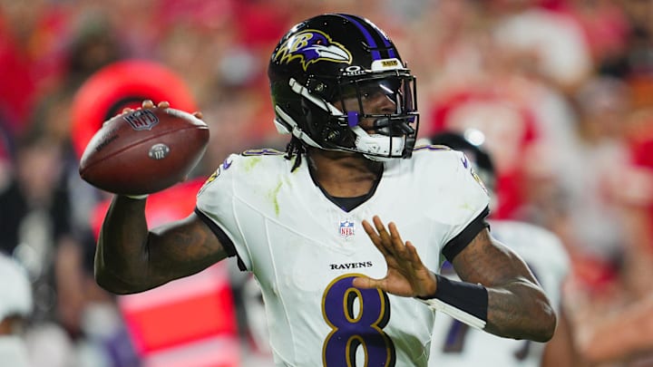 Sep 5, 2024; Kansas City, Missouri, USA; Baltimore Ravens quarterback Lamar Jackson (8) throws a pass during the first half against the Kansas City Chiefs at GEHA Field at Arrowhead Stadium. Mandatory Credit: Jay Biggerstaff-Imagn Images