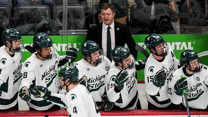 Michigan State head coach Adam Nightingale talks to players after a play against Michigan during the second period of Duel in the D at Little Caesars Arena in Detroit on Saturday, February 7, 2026.