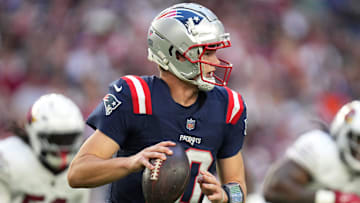 New England Patriots quarterback Drake Maye (10) scrambles out of the pocket against the Arizona Cardinals at State Farm Stadium on Dec 15, 2024.