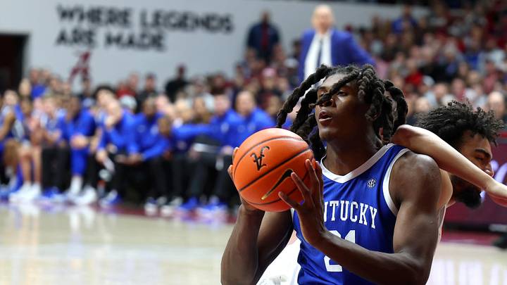 Jan 3, 2026; Tuscaloosa, Alabama, USA; Kentucky Wildcats forward Jayden Quaintance (21) recovers the ball during the second half against the Alabama Crimson Tide at Coleman Coliseum. Mandatory Credit: David Leong-Imagn Images