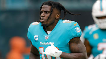 Dec 25, 2022; Miami Gardens, Florida, USA; Miami Dolphins wide receiver Tyreek Hill (10) takes to the field prior to the game against the Green Bay Packers at Hard Rock Stadium. Mandatory Credit: Sam Navarro-Imagn Images