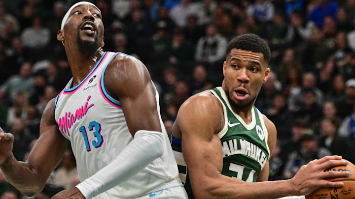 Jan 23, 2025; Milwaukee, Wisconsin, USA; Milwaukee Bucks forward Giannis Antetokounmpo (34) looks for a shot against Miami Heat center Bam Adebayo (13) in the second quarter at Fiserv Forum. Mandatory Credit: Benny Sieu-Imagn Images
