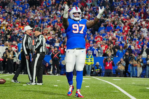 Buffalo Bills defensive tackle Zion Logue encourages the crowd to get loud.
