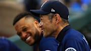 Apr 10, 2018; Kansas City, MO, USA; Seattle Mariners right fielder Ichiro Suzuki (51) talks with second baseman Robinson Cano (22) in the first inning against the Kansas City Royals at Kauffman Stadium. Mandatory Credit: Jay Biggerstaff-Imagn Images