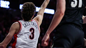 Jan 25, 2025; Tucson, Arizona, USA; Arizona Wildcats guard Anthony Dell’Orso (3) makes a back handed lay up while Colorado Buffaloes guard-forward Harrison Carrington (31) fails to bloke him during the second half at McKale Center. Mandatory Credit: Aryanna Frank-Imagn Images