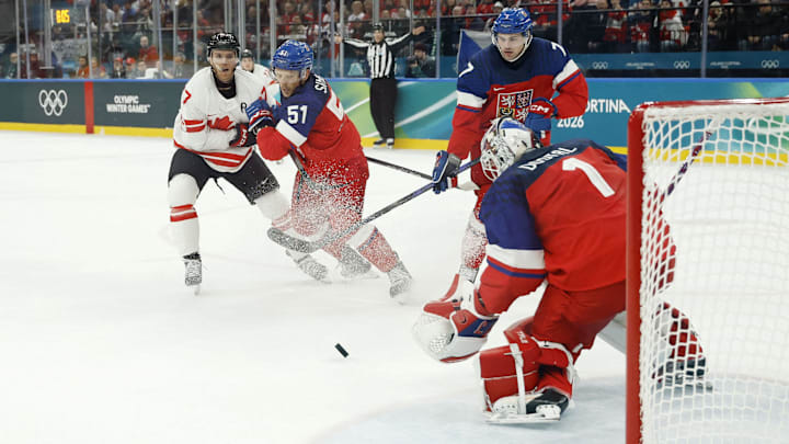 Feb 12, 2026; Milan, Italy;  Lukas Dostal of Czechia makes a save against Canada in a men's ice hockey group A match during the Milano Cortina 2026 Olympic Winter Games at Milano Santagiulia Ice Hockey Arena. Mandatory Credit: Geoff Burke-Imagn Images