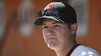 September 20, 2012; San Francisco, CA, USA; San Francisco Giants first baseman Brett Pill (6) in the dugout against the Colorado Rockies during the fourth inning at AT&T Park. 