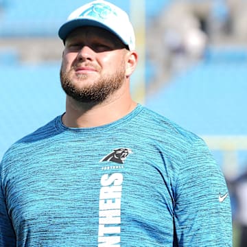 Aug 17, 2024; Charlotte, North Carolina, USA;  Carolina Panthers guard Cade Mays (64) during pregame warm ups against the New York Jets at Bank of America Stadium. Mandatory Credit: Jim Dedmon-Imagn Images