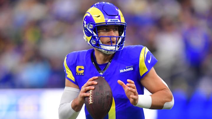 Jan 4, 2026; Inglewood, California, USA;  Los Angeles Rams quarterback Matthew Stafford (9) looks downfield against the Arizona Cardinals during the second half at SoFi Stadium. Mandatory Credit: Gary A. Vasquez-Imagn Images