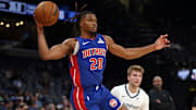 Oct 6, 2025; Memphis, Tennessee, USA; Detroit Pistons guard Chaz Lanier (20) saves the ball from going out of bounds during the fourth quarter against the Memphis Grizzlies at FedExForum. Mandatory Credit: Petre Thomas-Imagn Images