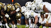 Aug 29, 2025; Boulder, Colorado, USA; Members of the Colorado Buffaloes line across from the Georgia Tech Yellow Jackets during the fourth quarter at Folsom Field. Mandatory Credit: Ron Chenoy-Imagn Images