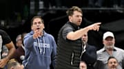 Jan 15, 2024; Dallas, Texas, USA; Dallas Mavericks guard Luka Doncic (right) and Mark Cuban (left) argue a call during the second half of the game against the New Orleans Pelicans at the American Airlines Center. Mandatory Credit: Jerome Miron-Imagn Images
