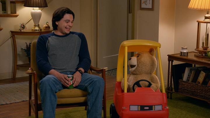 TED S2 -- Pictured: (l-r) Max Burkholder as John, Seth MacFarlane as voice of Ted -- (Photo by: Peacock)